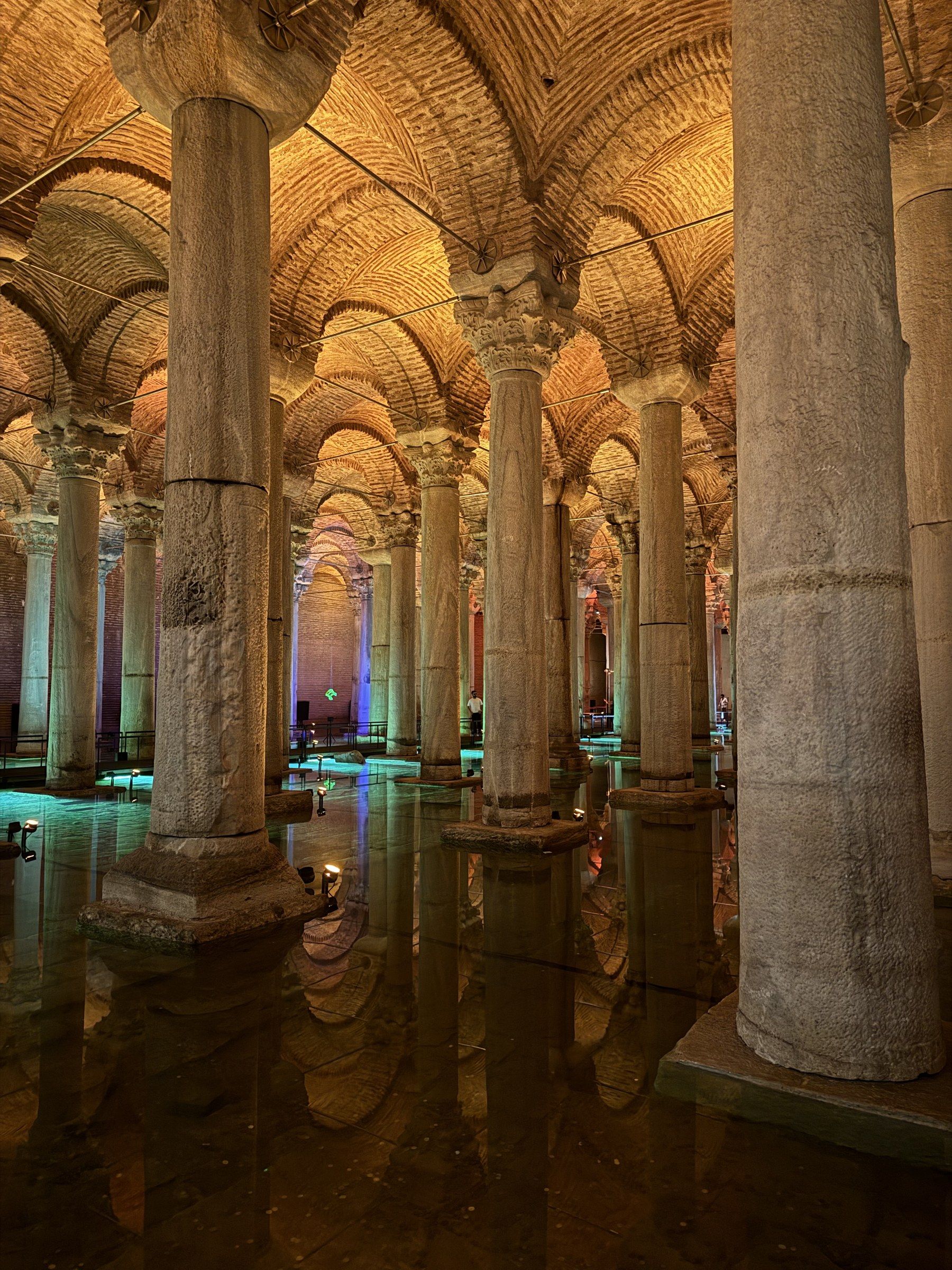 The columns of the Basilica Cistern reflected in dark water