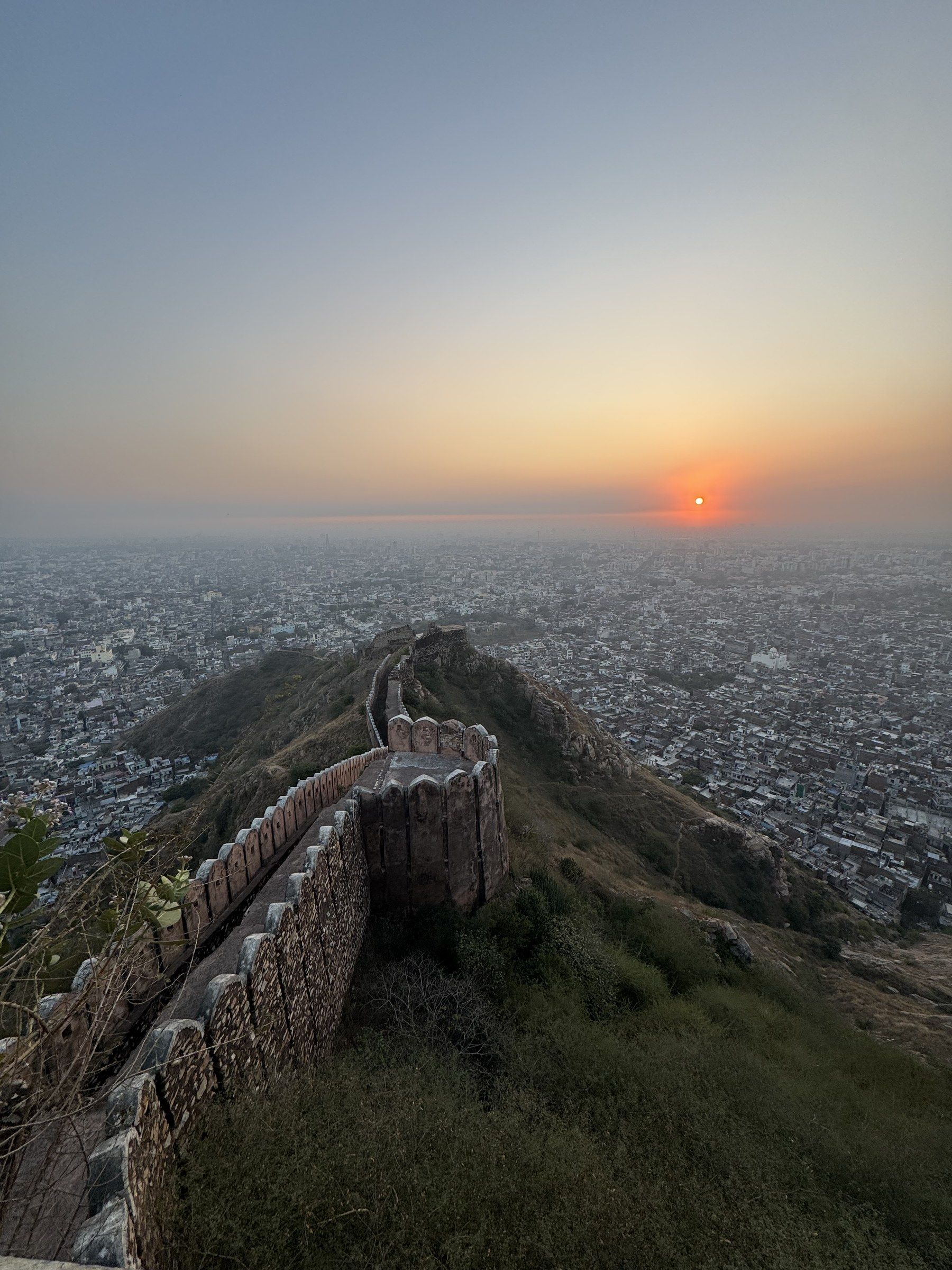 Sunset over Jaipur seen from the walls of a hilltop fort